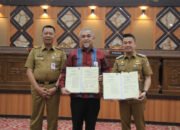 PJ Wako Pekanbaru Didampingi Sekdako Tandatangani MoU dengan BRK Guna Tingkatkan Pelayanan Administrasi