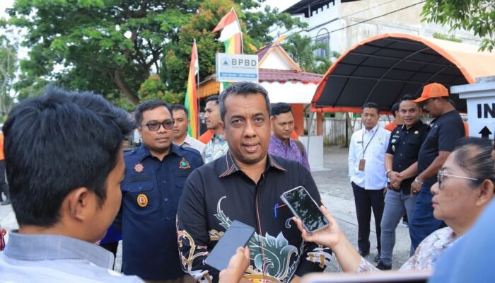 Antisipasi Banjir dan DBD, PJ Walikota Pekanbaru Ajak Masyarakat Jaga Kebersihan Lingkungan