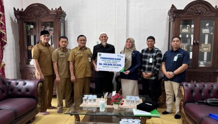 BPJS Ketenagakerjaan Laporkan Angka Universal Coverage Jamsostek Kota Dumai kepada Walikota