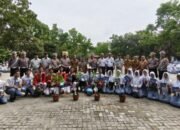 Police Go To Scholl, Dirlantas Polda Riau Pimpin Upacara Senin di SMKN 7 Pekanbaru