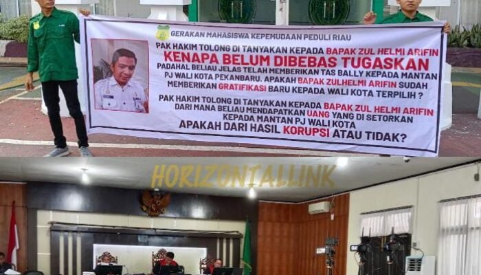 Ditengah Sidang Eks Pj Walikota Pekanbaru Cs Berlangsung, Aksi GMKPR Bentangkan Seruan di Depan PN : Kenapa Zulhelmi Belum Dibebastugaskan